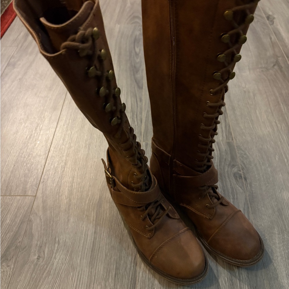 Tall combat looking boots